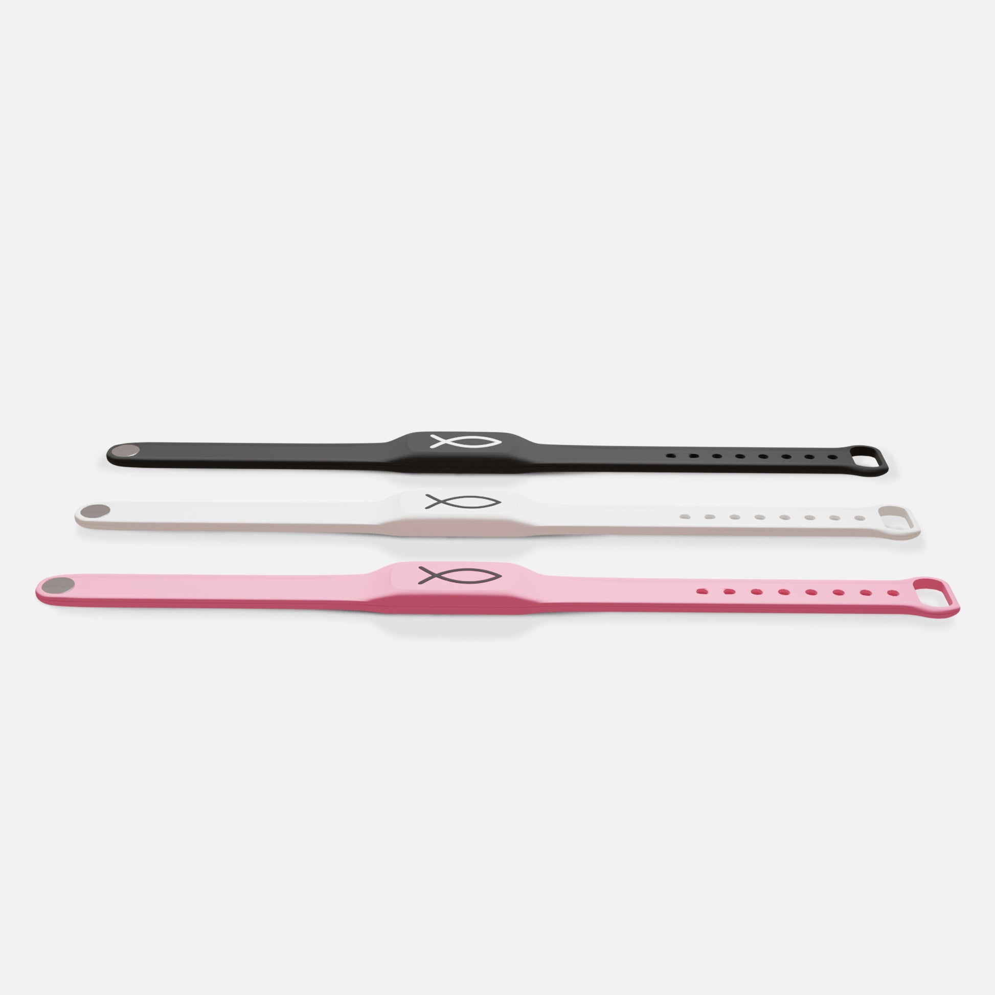 Three bracelets in black, white, and pink on a white background