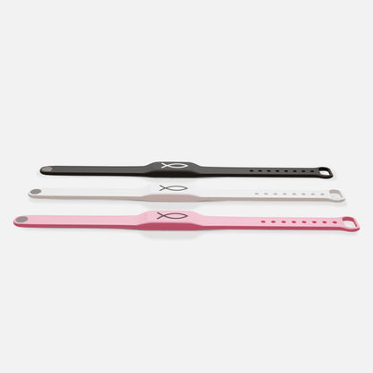 Three bracelets in black, white, and pink on a white background